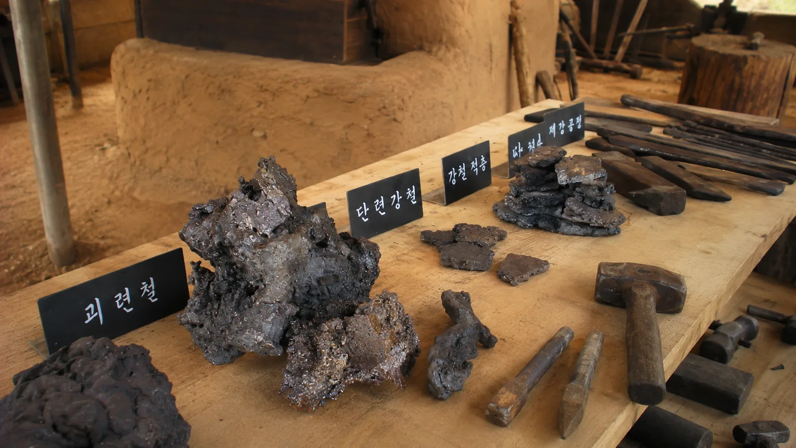 Iron samples and traditional blacksmithing tools related to the Sungnyemun Gate restoration project